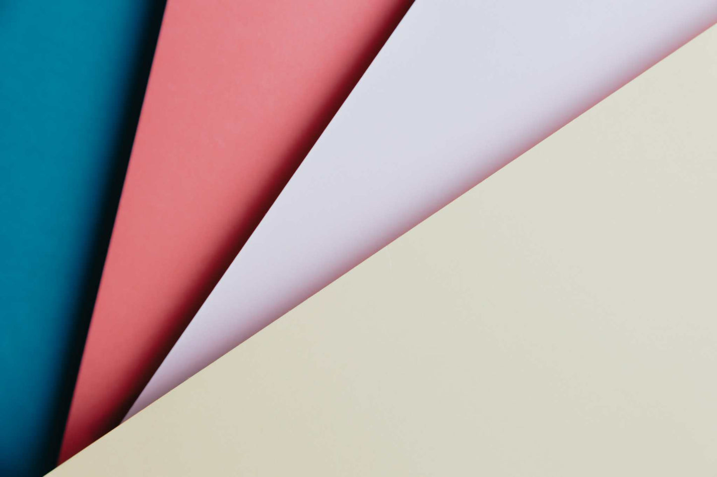 Pattern Printing Service A4 showing printed papers in blue, red, white, and cream colors for creative projects