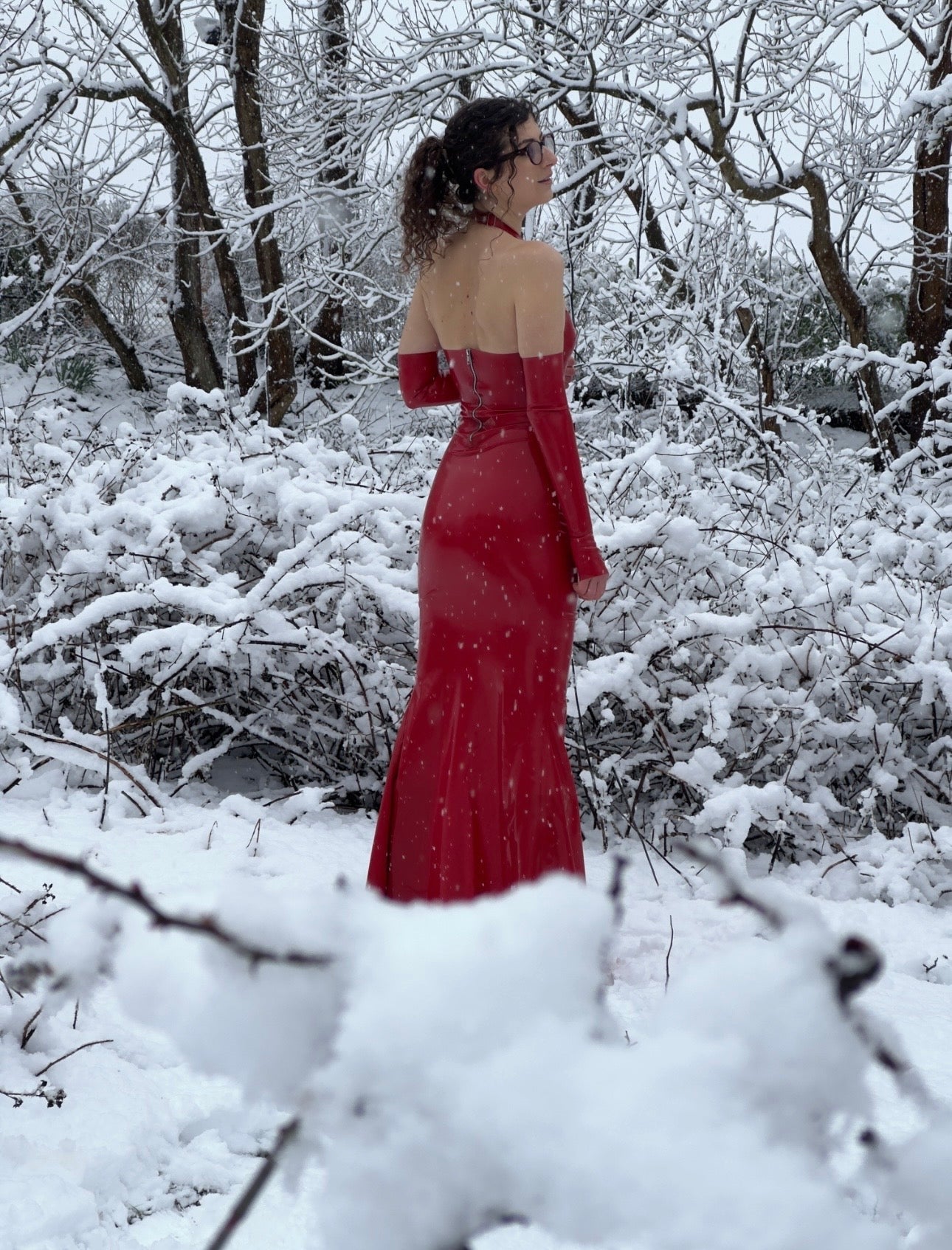 High-shine latex catsuit with cupped halter neck and fitted silhouette